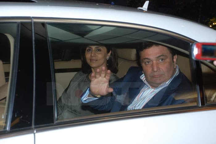 Rishi Kapoor and Neetu Singh leave the venue after the party.