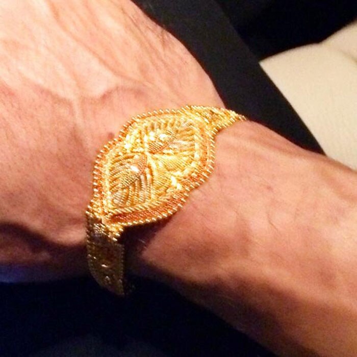 Superstar Shah Rukh Khan also shared a picture of the rakhi on his wrist, tied by West Bengal Bengal Chief Minister Mamata Banerjee. He captioned it "Happy RAKHI to everyone. Mine already started with Mamata Didi tying me mine. Thank you Kolkata & the Police Deptt". <br><br>

This image was posted on Twitter by <a href="https://twitter.com/iamsrk" target="_blank" rel="nofollow" >iamsrk</a>