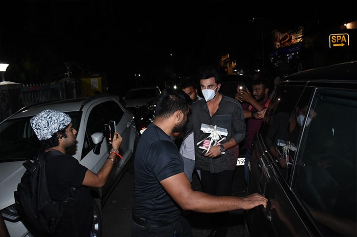 Ranbir Kapoor was snapped with a gift in his hand.