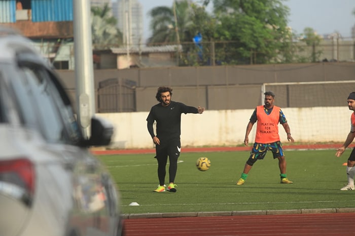 Arjun Kapoor was photographed playing football.