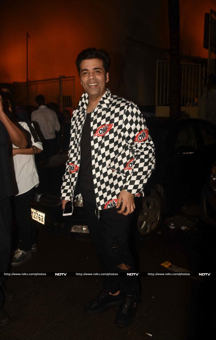 KJo was all smiles in black distressed denims paired with a quirky jacket.