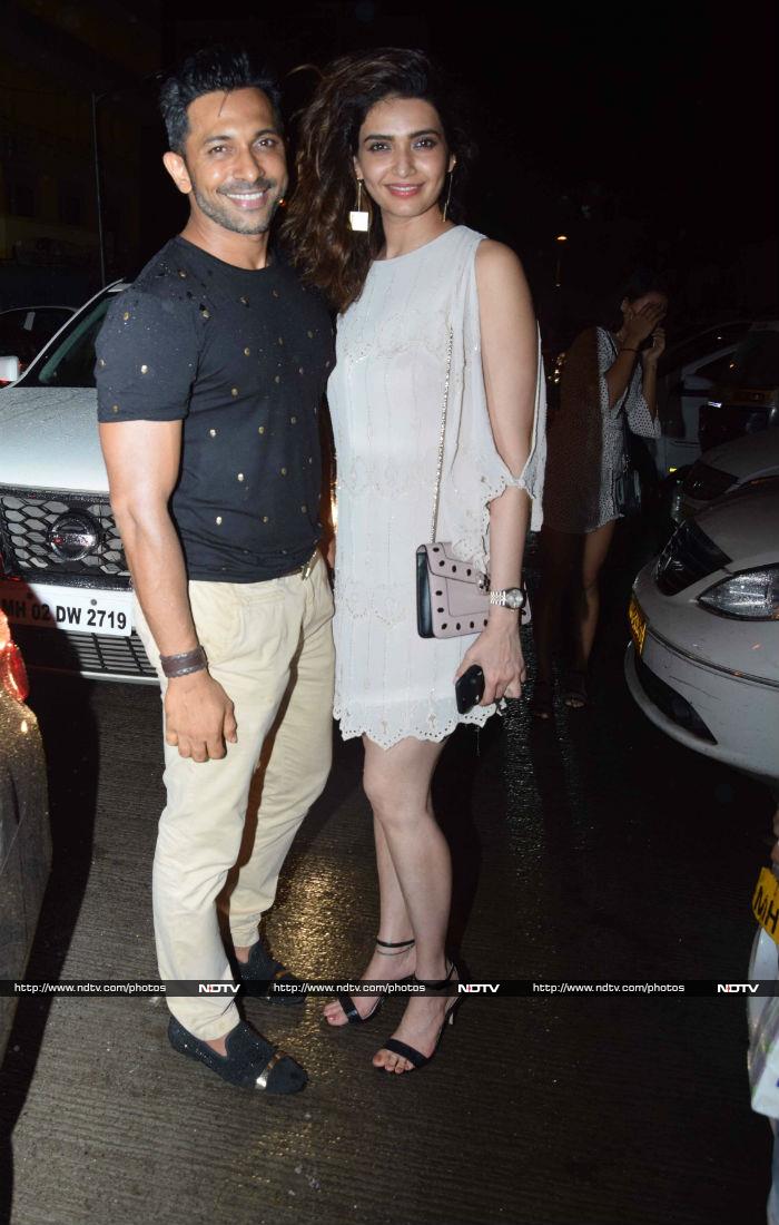 Karishma Tanna and Terence Lewis smiled at the paparazzi.