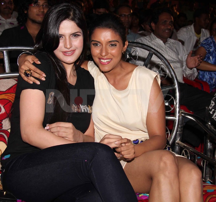 Zarine and Asin get close for the cameras.