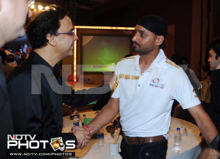 Director and producer Vidhu Vinod Chopra greets Bhajji.