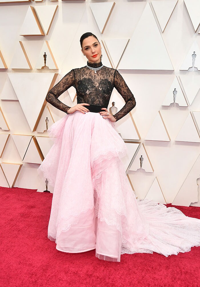 Gal Gadot's black lace and pink frills gown by Givenchy gives a fairy-tale vibe. She paired it with a Tiffany necklace.