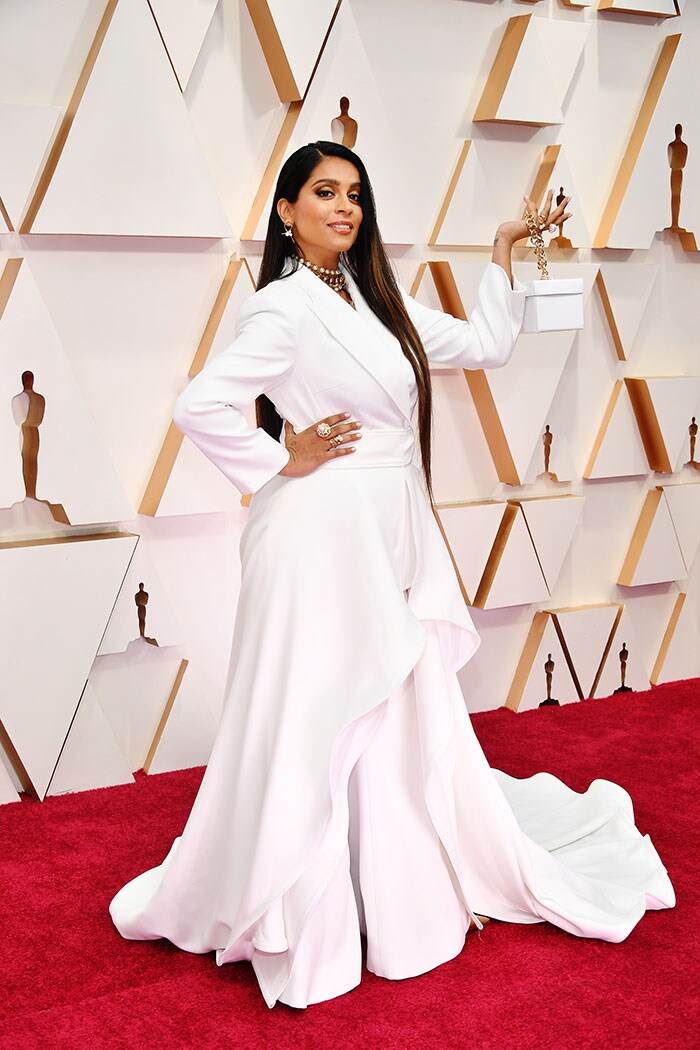 Chat show host Lilly Singh looked dreamy in white with a mini white bag by Adeam.