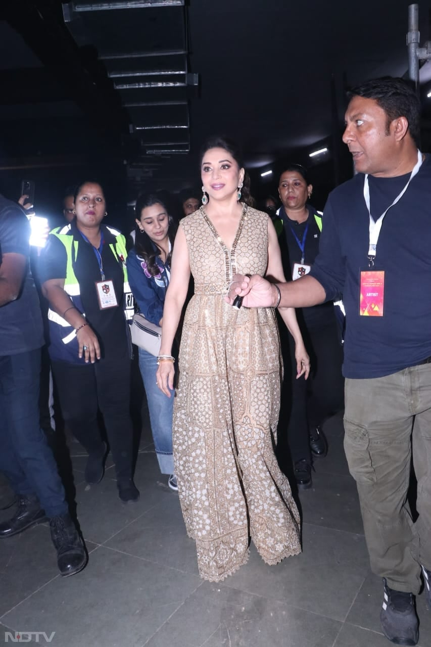 Madhuri Dixit looked stunning in a golden ensemble (Image Courtesy: Varinder Chawla)