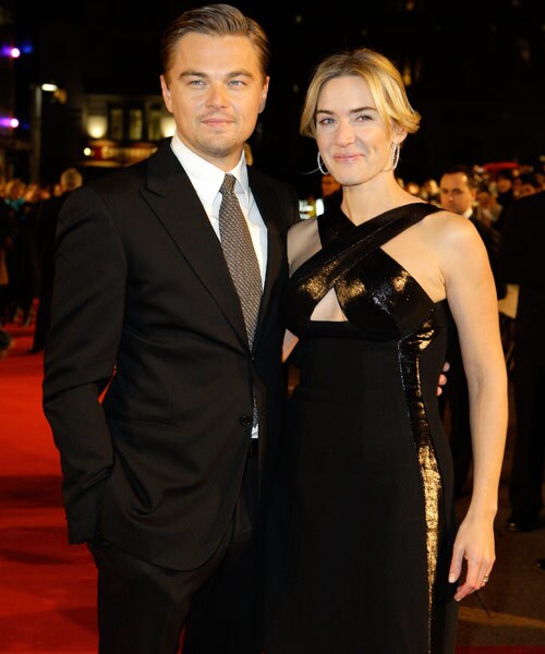 British actress Kate Winslet, right, and U.S. actor Leonardo DiCaprio, left, arrive on the red carpet for the European premiere of <I>Revolutionary Road</i>, at a central London cinema.