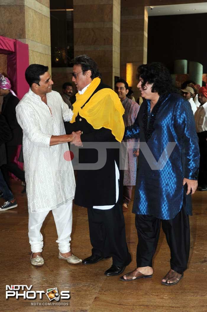 Akshay Kumar, Jackie Shroff and Sajid Khan share a light moment at the wedding.