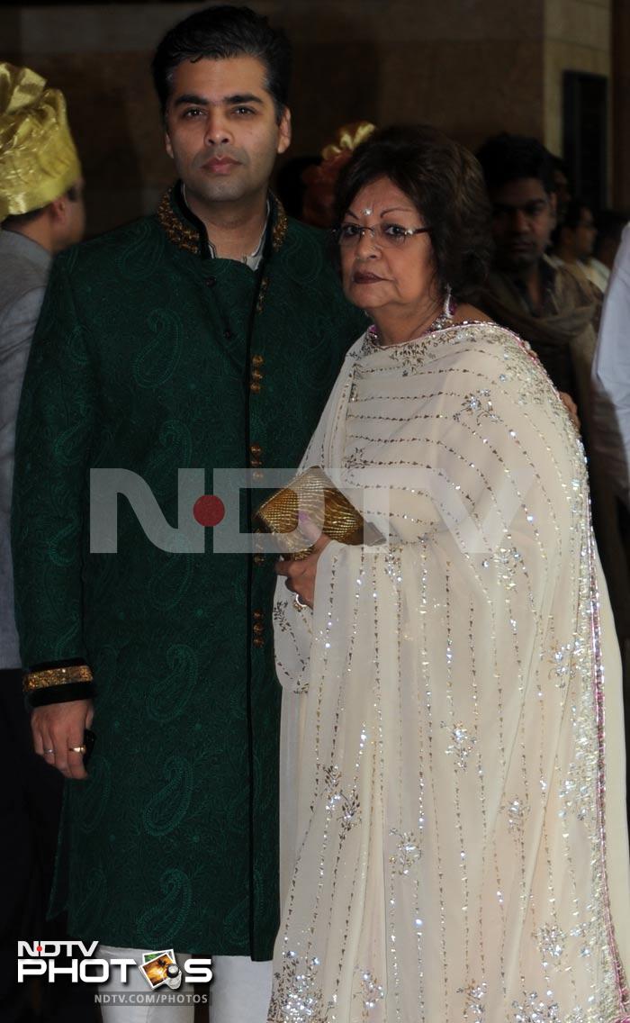 KJo, who had compered Riteish-Genelia's <I>sangeet</i> earlier this week, came with his mom Hiroo Johar.