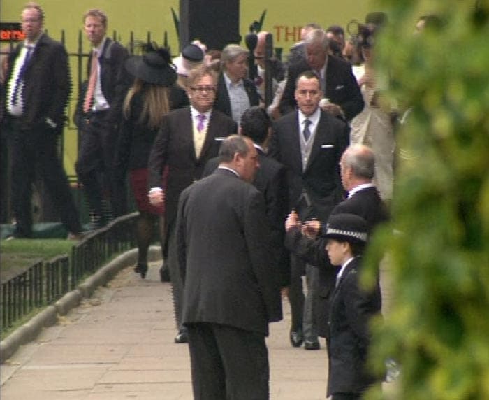 Sir Elton John and partner David Furnish arrive at the Abbey.