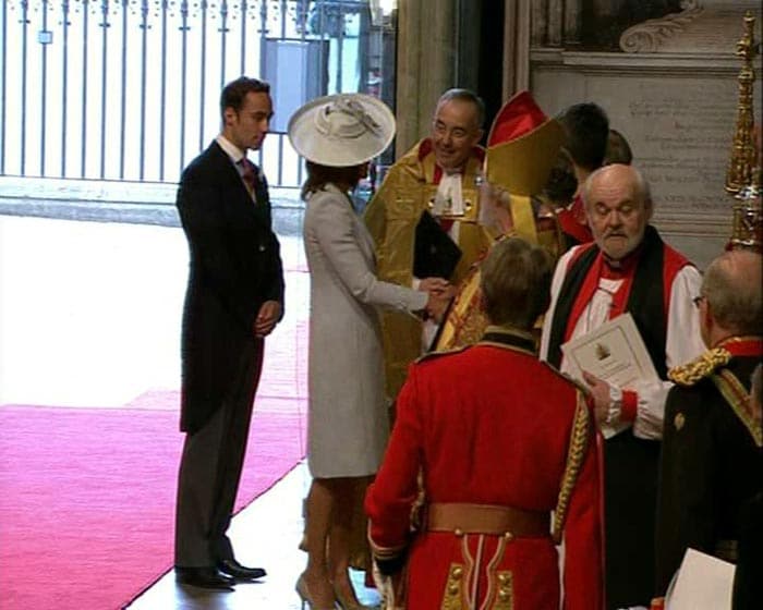 Carole is seen greeting the Archbishop.