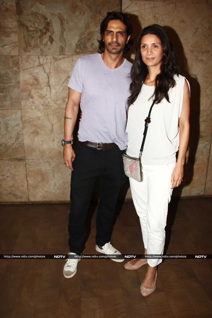 Actor Arjun Rampal attended the screening of his new film <i>Roy</i> with his wife Mehr in Mumbai on February 12. The actor was dressed casually in loose pants and tee with Mehr matching her husband's style in white cropped pants and matching top.