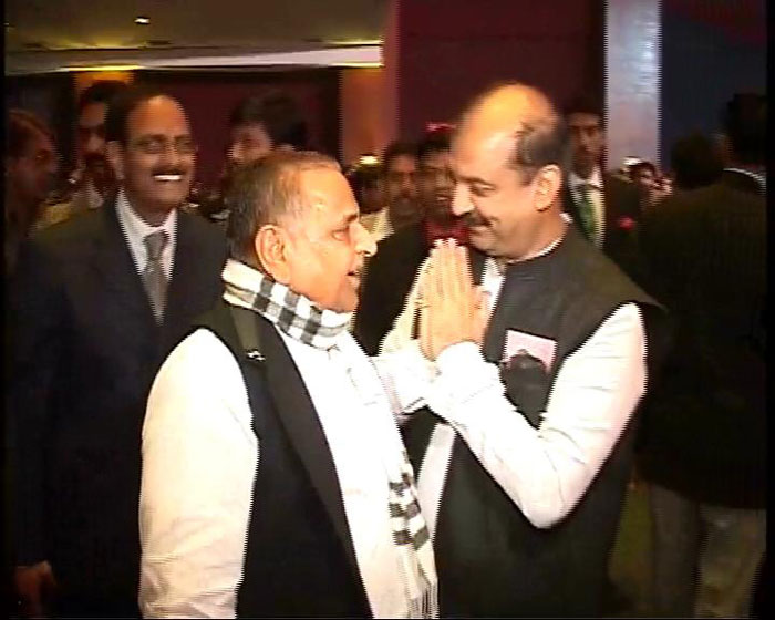 Samajwadi Party chief Mulayam Singh Yadav receives a warm welcome at the wedding.