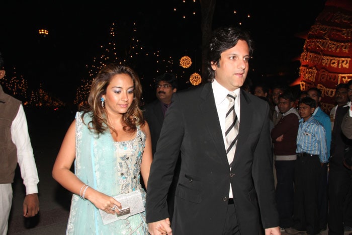 Actor Fardeen Khan and his wife Natasha arrive for the wedding.