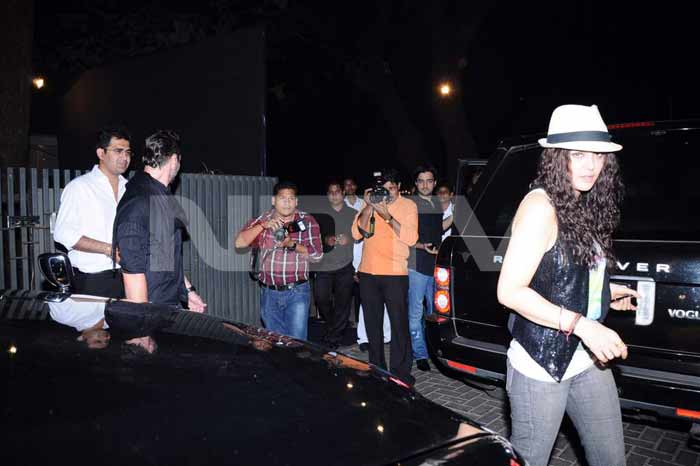 Preity runs from an army of reporters.