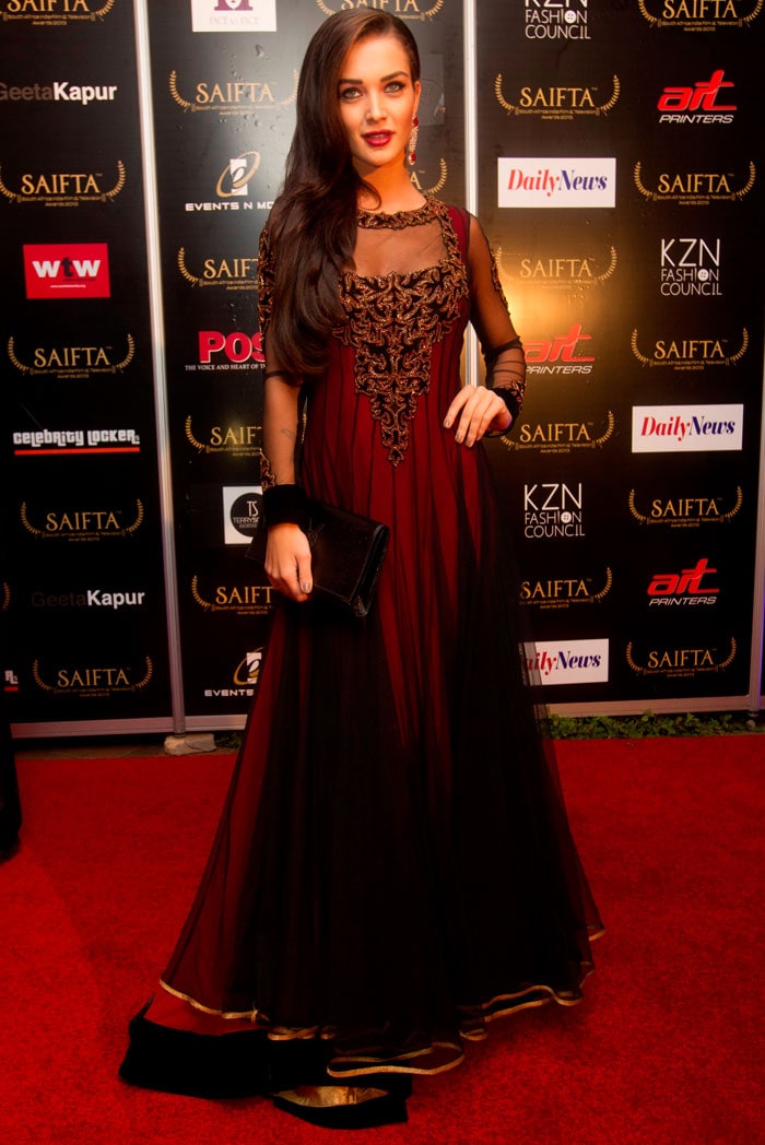 Model turned actress Amy Jackson also opted for maroon as she looked pretty in a gown.