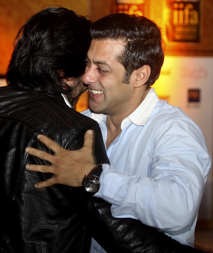 Bollywood actor Salman Khan, right, greets fellow actor Ritesh Deshmukh as he arrives to address a press conference in Mumbai. The news conference was held to promote the International Indian Film Academy (IIFA) weekend and awards which will be held later in the year in Sri Lanka. (Photo: AP)