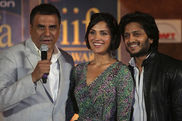 Bollywood actor Boman Irani, left, speaks as fellow actors Lara Dutta and Ritesh Deshmukh look on during a press conference in Mumbai. The news conference was held to promote the International Indian Film Academy (IIFA) which will be held later in the year in Sri Lanka. (Photo: AP)