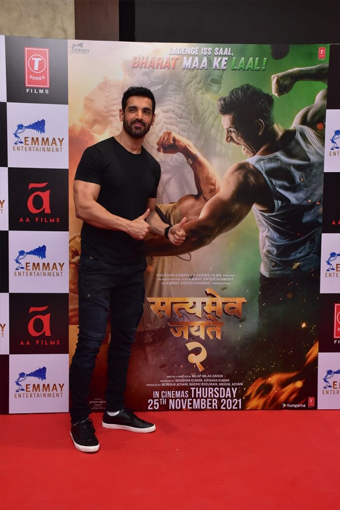 John Abraham was sporting a black tee and jeans.  (Image courtesy: Varinder Chawla)