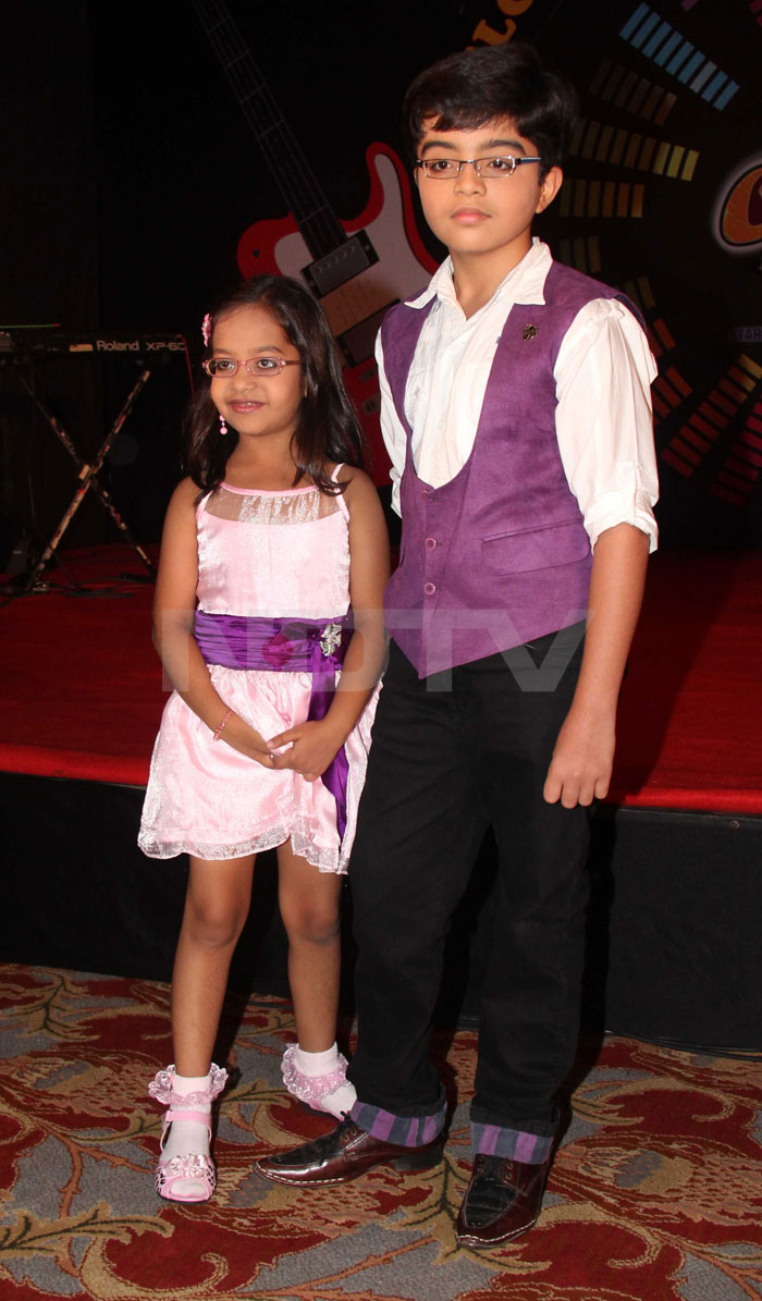 Child-hosts Afsha Musani and Dhairya Sorecha pose for the shutterbugs.