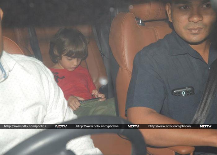 Shah Rukh Khan and Gauri's son AbRam kept himself busy on his iPad.