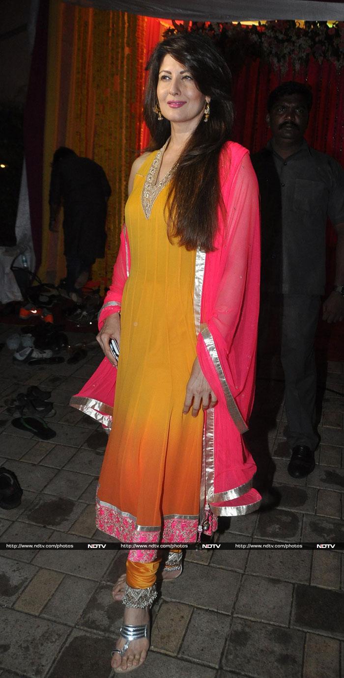 Actress and former model Sangeeta Bijlani, beautiful in a yellow and pink <i>salwar kameez</i>, was also part of the Khan celebrations.