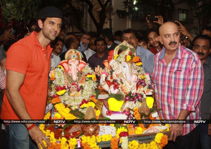 Hrithik and father Rakesh Roshan with the idols.