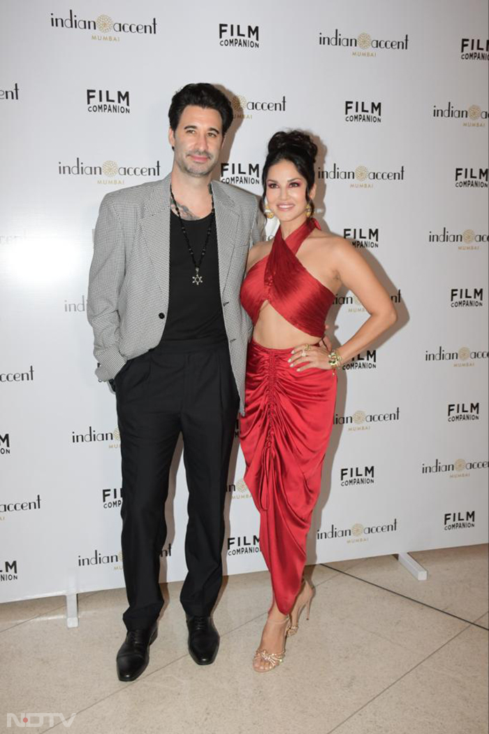 Red alert for Sunny Leone. She was accompanied by husband Daniel Weber. (Image courtesy: Varinder Chawla)