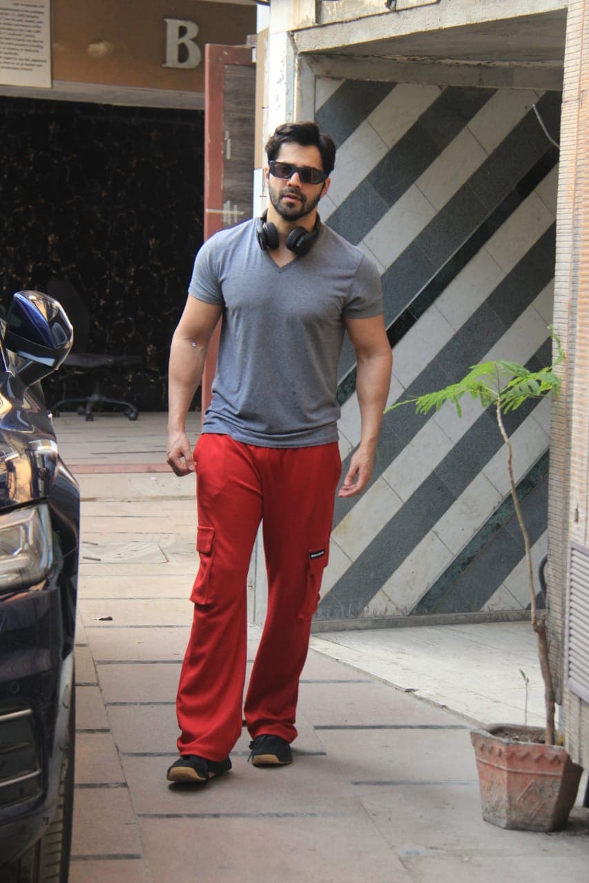 Varun Dhawan picked a grey shirt and red pants for his day out.