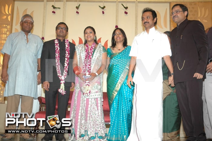 The newlyweds with M K Stalin (in white).<br><br> Ahead, images from the wedding.