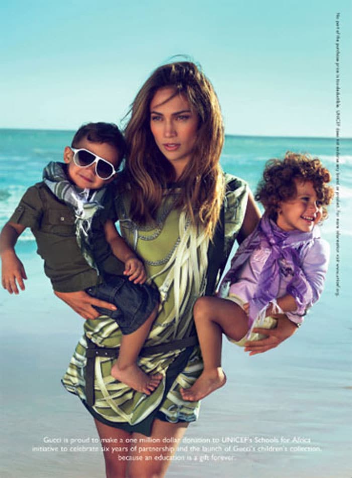 As the sultry fashionista pulls off her most camera friendly look, her two kids just look plain happy to be out on the beach on a sunny day. ( Photo Credit: Gucci)