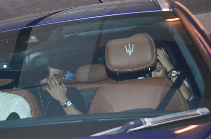 The paps could barely manage glimpses of Arjun and Malaika being driven in together.