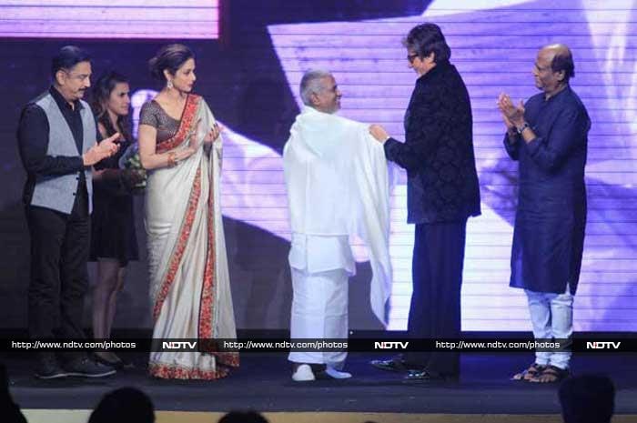 Amitabh Bachchan placed a shawl around Ilaiyaraaja while Sridevi, Kamal Haasan and Rajinikanth applauded.