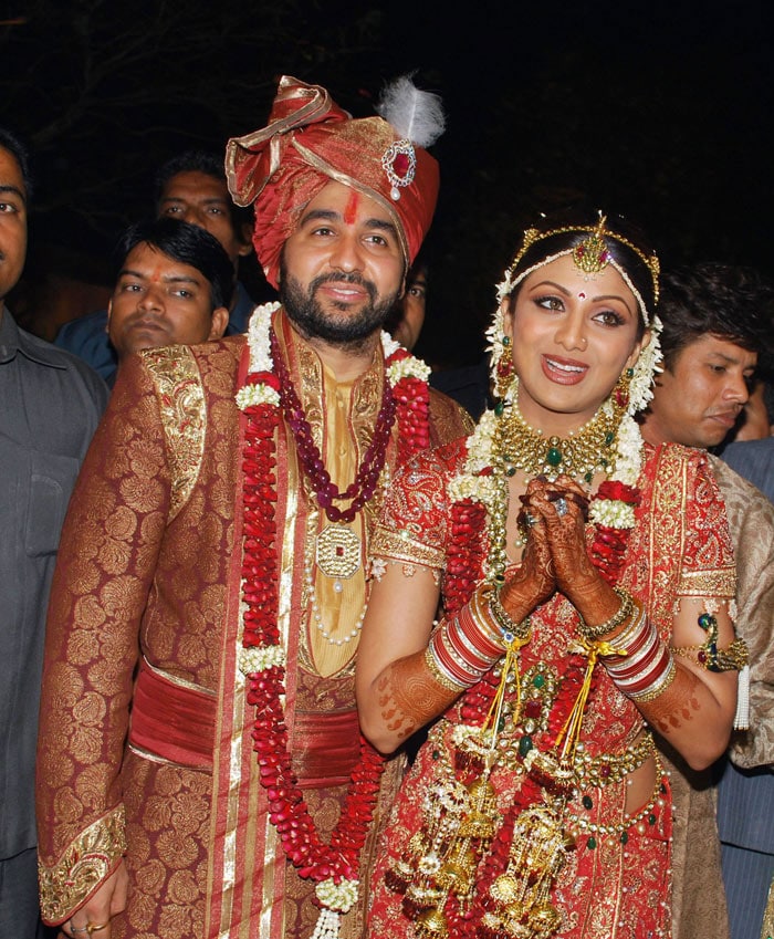 Shilpa too sported Kundan  jewellery to go with her bright red saree. (Photo: AFP)