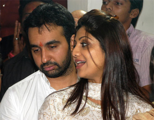 In the midst of denying her marriage rumours and managing to get back her father's passport, actress Shilpa Shetty took time out for Ganesh Chaturthi celebrations in Mumbai. She was accompanied by her beau Raj Kundra. (Pics: IANS)