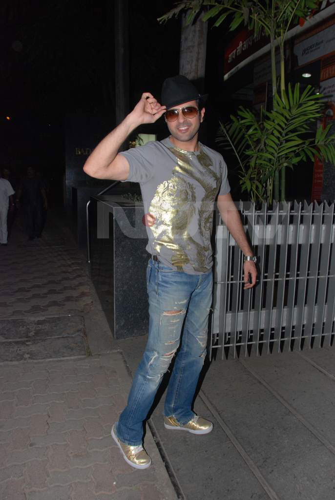 Clown Alert: Harman's the farthest from being a Hrithik look-alike in the golden sneakers and the frayed denims.