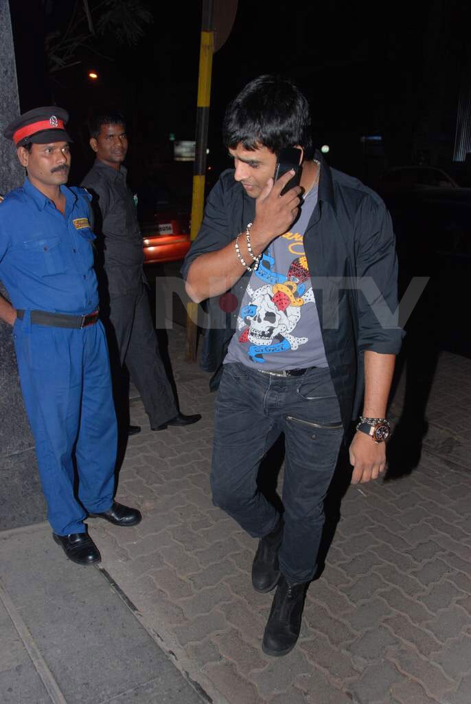 Madhavan, minus the wife, can't get off the phone.