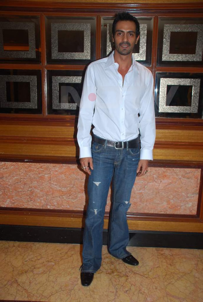 Arjun Rampal pauses to pose for the shutterbugs.