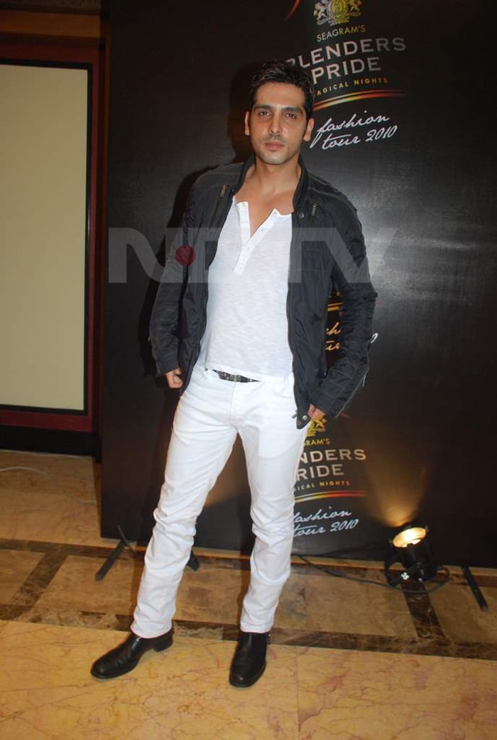 Zayed Khan carries off the white pants with ease.