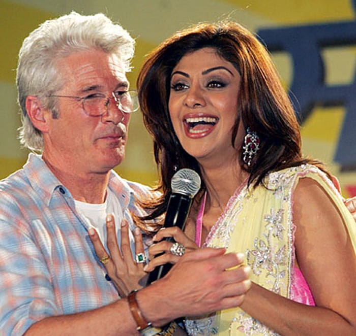 The year 2007 was determined to be a big one in Shilpa's life. Apart from all the Big Brother controversy, she was also caught in a controversy with Hollywood star Richard Gere. The two had met for an AIDS awareness event, where Gere publicly kissed her on the cheek a few times, raising the ire of right-wing groups. The event reached such proportions that arrest warrants for Shilpa and Gere were issued, but later suspended.