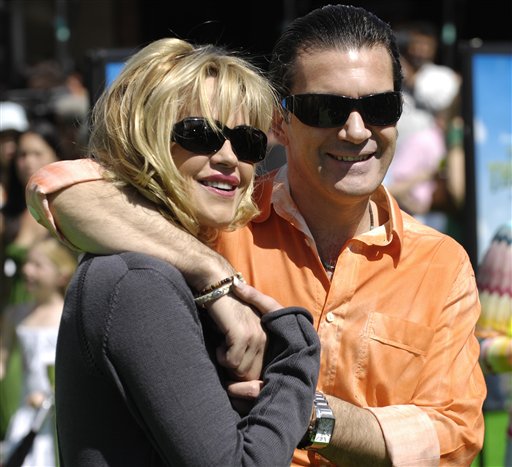 Shrek the Third cast member Antonio Banderas, right, and his wife, actress Melanie Griffith, arrive for the premiere of the film in Los Angeles.