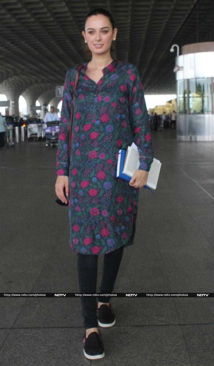 Evelyn Sharma was also spotted at the airport. She was dressed simply in a green and pink <i>kurta</i> and black jeggings.