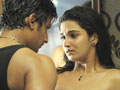 Jeeva romances Divya in <i>Singam Puli</i>