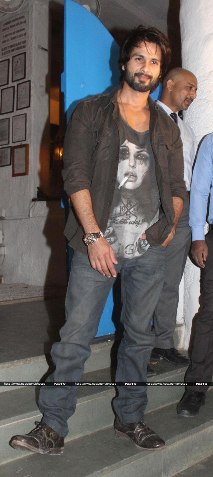 Actor Shahid Kapoor, dressed casually in jacket and denims, poses for the cameras.