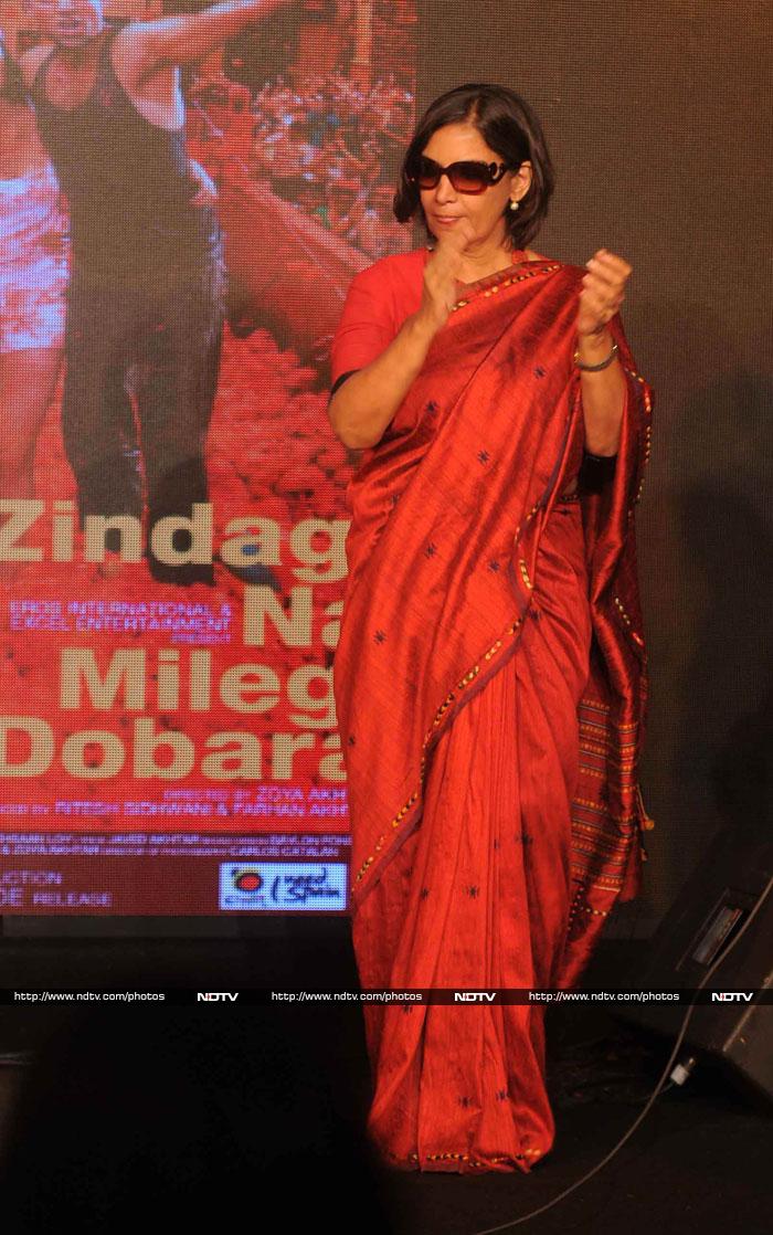 Shabana Azmi wore her red <I>sari</i> with sunglasses.