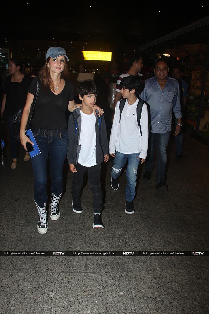 Sussanne Khan was spotted with Hrehaan and Hridhaan at the airport.