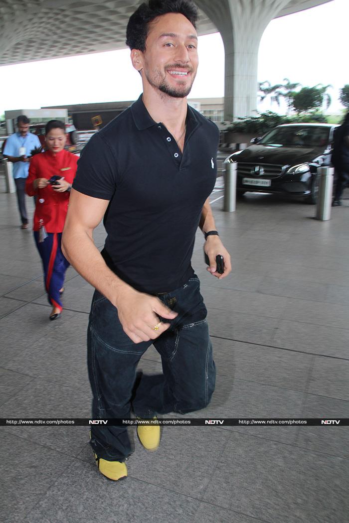 Run, Tiger Shroff, run! You must not miss the flight.