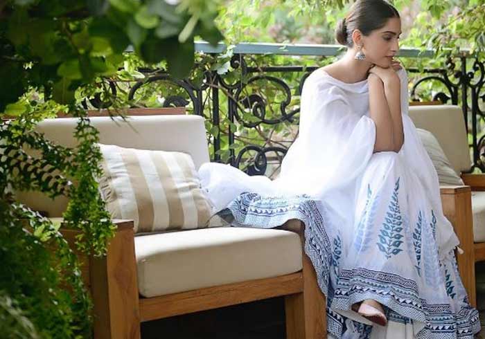 Sonam Kapoor was a perfect blend of pristine and ethnic as she was photographed in a white suit designed by Anita Dongre. Sonam shared beautiful pictures from the shoot on Instagram on June 12. <br><br>This image was posted on Instagram by <a href=" https://www.instagram.com/sonamkapoor/ " target="_blank" rel="nofollow" >sonamkapoor</a>.