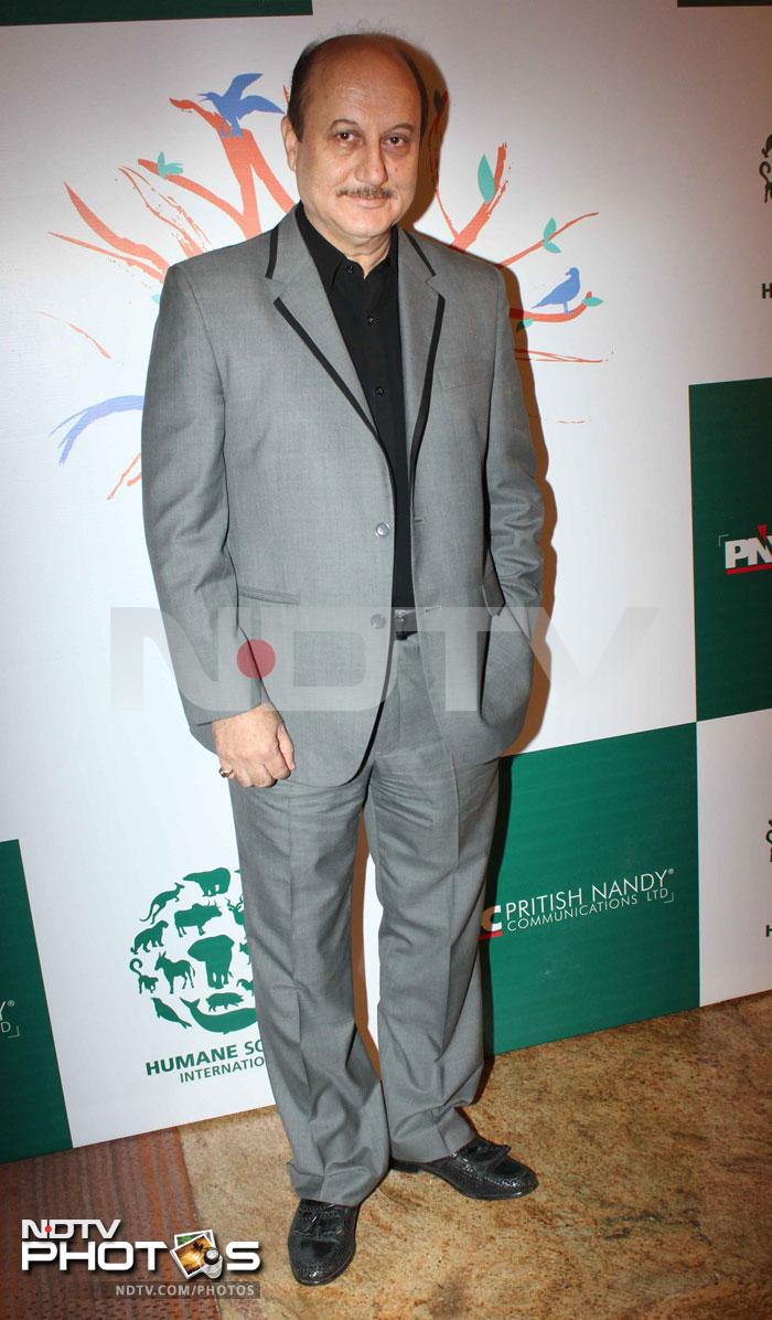 Anupam Kher is suited up for the event. <br><br>Coming up: John Abraham is the sexiest man alive